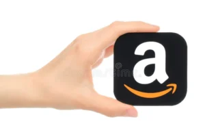 hand holds amazon icon printed paper kiev ukraine may american electronic commerce company 76831874